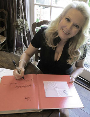 Kym signs the Limited Edition of The Sound of Music Family Scrapbook 2012