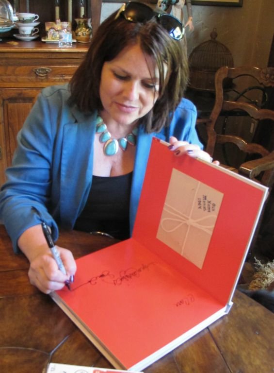 Debbie signs the Limited Edition of The Sound of Music Family Scrapbook 2012