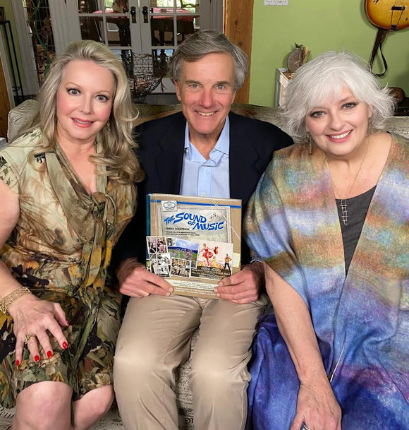 Kym, Nicholas & Angela with their new 55th Anniversary edition of  'Sound of Music Family Scrapbook'. 