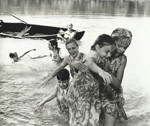 Heather rescues Kymmie from going under the water.