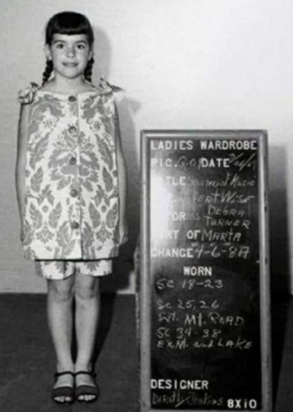 Debbie in her Do Re Mi dress in continuity photo