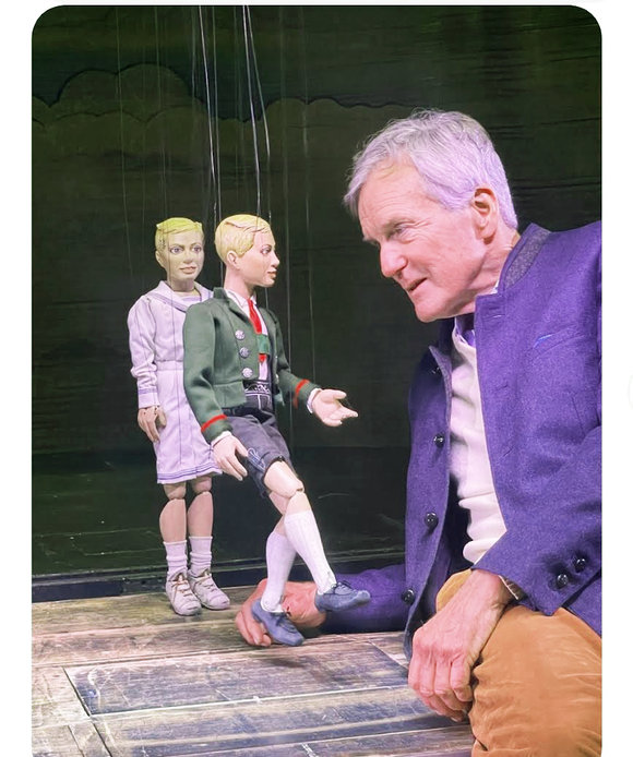 Nicholas meets his Frederich Marionette at the Salzburg Marionette Theater where every fall they perform 'The Sound of Music'